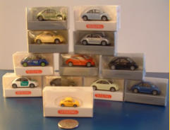 Wiking came out with a bunch of these "HO" scale NBs in various colours and logos.  An even smaller one was issued for the German Post Office.  A German police car is also shown.
