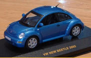 IXO 1:43 Techno Blue, 2003.  Has shorter antenna than others, pattern on the seats, and no bud vase.