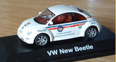 I made this from a regular 1:43 Schuco toy into a Toronto Police Car (Safety Bug)... still have to install a light bar.